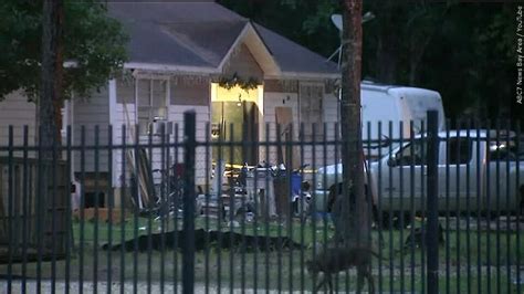 Sheriff tells AP the wife of man suspected of killing 5 neighbors, including a 9-year-old boy, has also been arrested